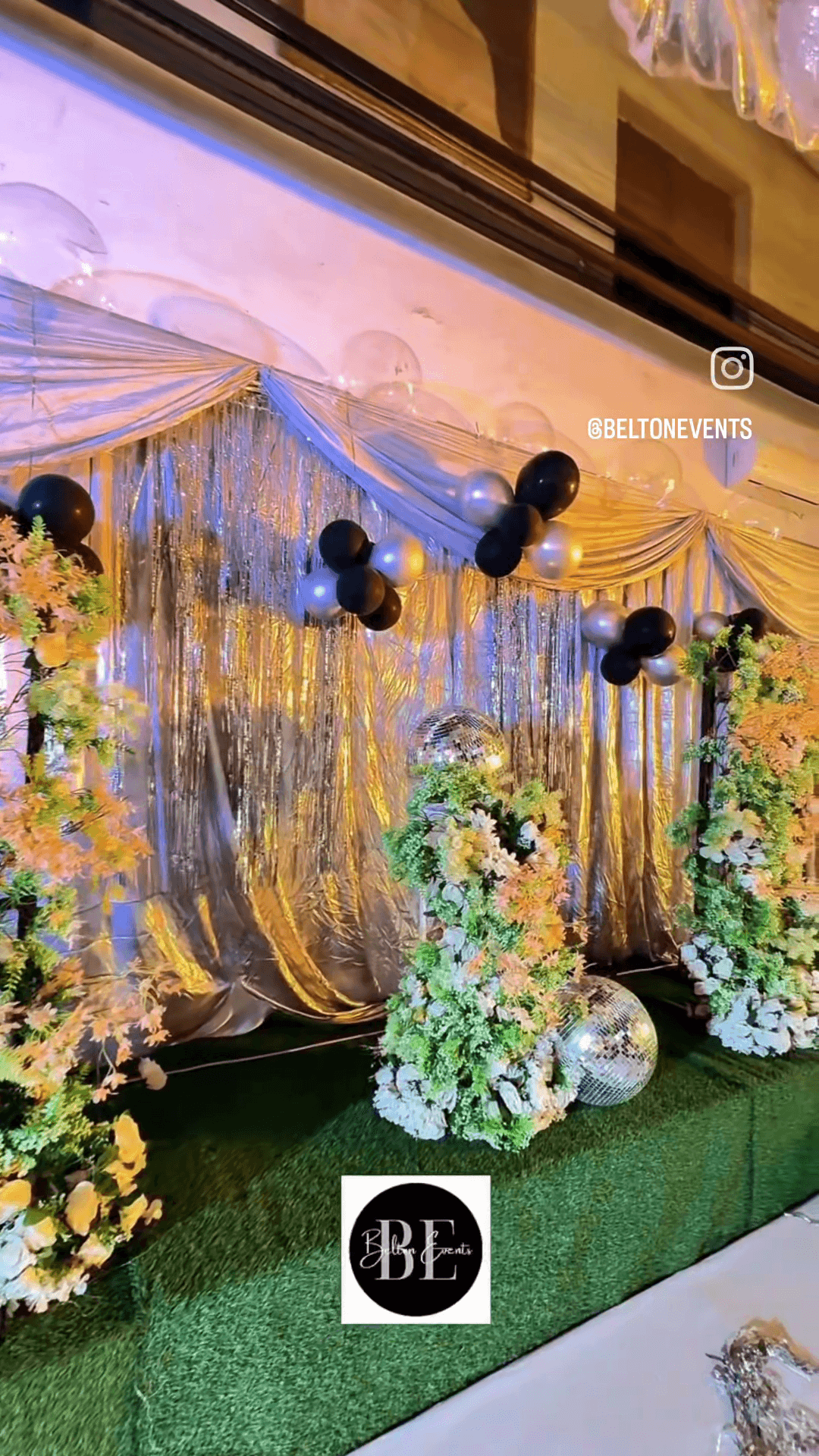 Balloon arch and disco ball styling